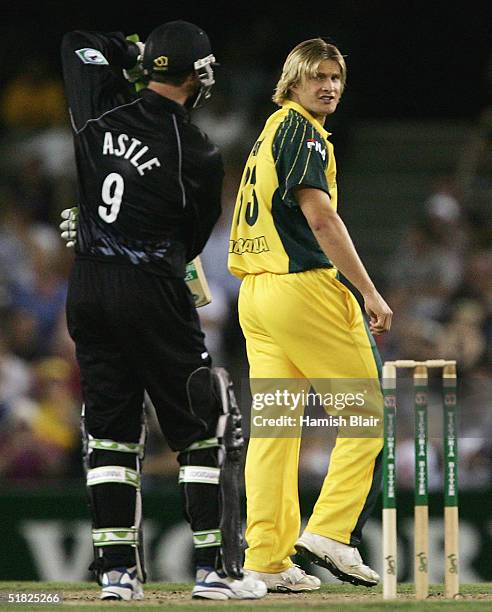 Shane Watson of Australia exchanges words with Nathan Astle of New Zealand after an appeal was turned down during game one of the Chappell-Hadlee...