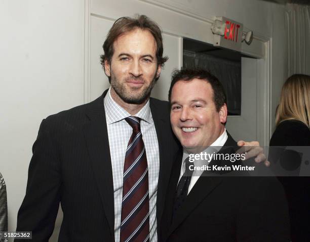 Actor Scott Patterson and David Janollari, Pres. WB Entertainment, pose at The WB Networks' "Gilmore Girls" 100th episode party at The Space on...