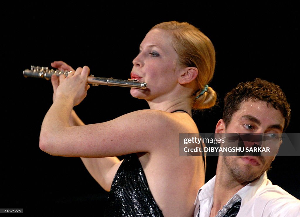 A flautist (L) of the Berlin based Germa