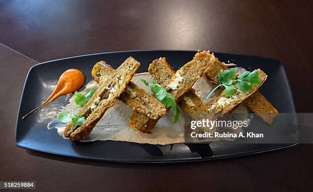 Kadak Seekh Kebabs at Michelin-starred chef Vikas Khanna's restaurant, Junoon at the Shangri-La hotel on March 30, 2016 in Dubai, United Arab...
