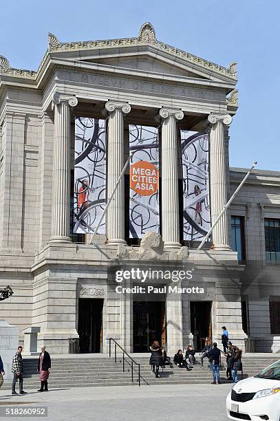 The facade of the Museum of Fine Arts Boston with the banner for the MEGACITIES ASIA exhibit featuring 11 works by 19 artists from China, India and...