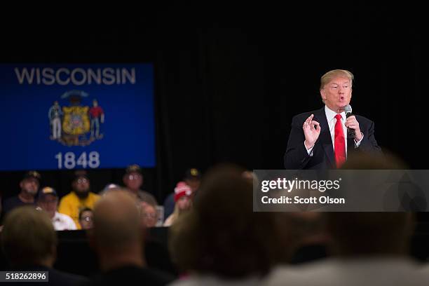 Republican presidential candidate Donald Trump speaks to guests during a campaign rally at the Radisson Paper Valley Hotel on March 30, 2016 in...