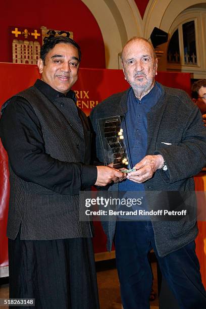 Director Jean-Claude Carriere presents the Price Henri Langlois to Indian actor and director Kamal Haasan during the "10th International meetings of...