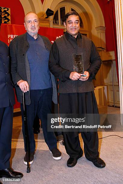 Director Jean-Claude Carriere presents the Price Henri Langlois to Indian actor and director Kamal Haasan during the "10th International meetings of...