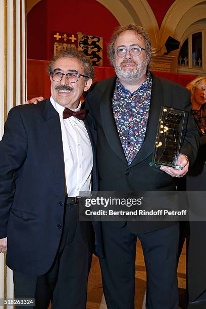 Director Ferid Boughedir presents the Price Henri Langlois to Belgian Director Jaco van Dormael during the "10th International meetings of the...