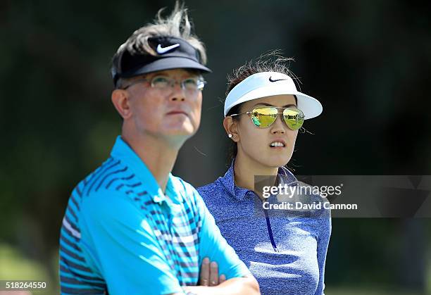 Michelle Wie of the United States with her father B.J.Wie during the pro-am as a preview for the 2016 ANA Inspiration Championship at the Mission...