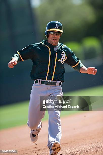 Sam Fuld of the Oakland Athletics runs the bases during a spring training game against the Chicago White Sox at Camelback Ranch on March 10, 2016 in...