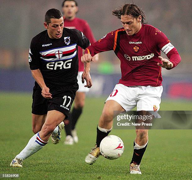 Francesco Totti of Roma attempts to control the ball from Angelo Palombo of Sampdoria during the Serie A: Roma v Sampdoria match on December 5, 2004...