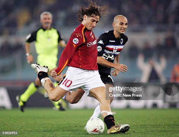 Francesco Totti of Roma attempts to control the ball from Giulo Falcone of Sampdoria during the Serie A: Roma v Sampdoria match on December 5, 2004...