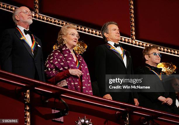 Four of the 27th Annual Kennedy Center Honorees conductor John Williams, opera diva Joan Sutherland, actor Warren Beatty, music legend Elton John...