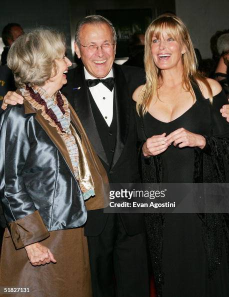 Secretary of Defense Donald Rumsfeld poses with his wife Joyce and ...