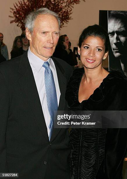 Director Clint Eastwood and wife Dina Eastwood attend a special screening of "Million Dollar Baby" on December 5, 2004 at the Museum of Modern Art,...