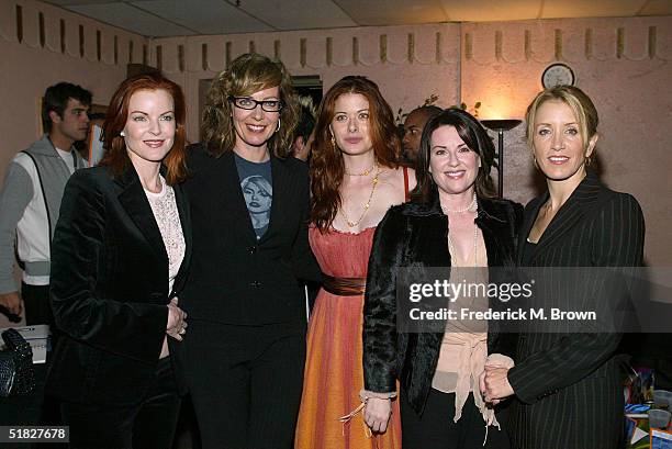 Actresses Marcia Cross, Allison Janney, Debra Messing, Megan Mullally and Felicity Huffman attend the "Annual Cracked XMAS 7" charity function on...