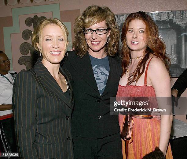 Actresses Felicity Huffman, Allison Janney and Debra Messing attend the "Annual Cracked XMAS 7" charity function on December 5, 2004 at the Wiltern...