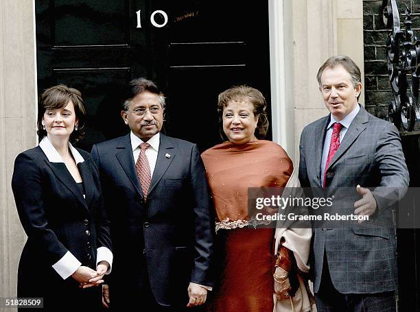 Prime Minister Tony Blair and his wife Cherie stand alongside Pakistan President Pervez Musharraf and his wife Sehba outside 10 Downing St on...