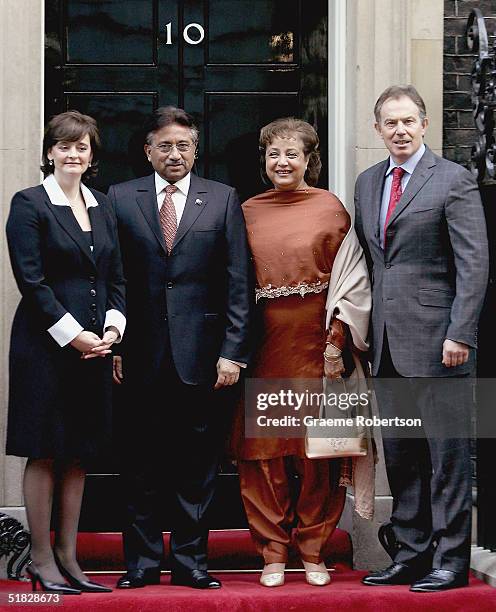 Prime Minister Tony Blair and his wife Cherie stand alongside Pakistan President Pervez Musharraf and his wife Sehba outside 10 Downing Street on...