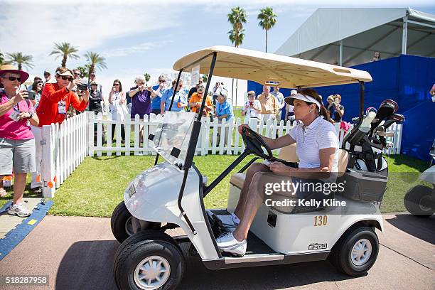 Caitlyn Jenner passes fans on the 18th hole after participating in the LPGA's ANA Inspiration Pro-Am at Mission Hills Country Club on March 30, 2016...