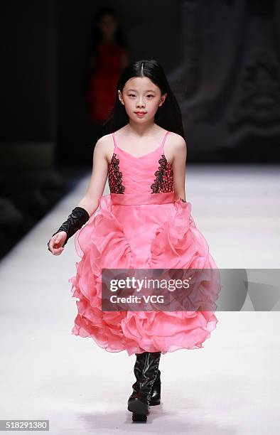 Model showcases designs on the runway at J.Queen & Little Collection during the Mercedes-Benz China Fashion Week Autumn/Winter 2016/2017 at Beijing...