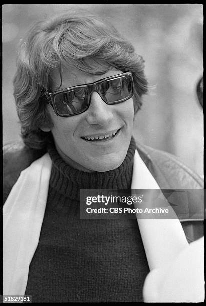 Portrait of Algerian-born fashion designer Yves Saint Laurent in sunglasses during the CBS special 'The Paris Collections Fall Fashion Preview,' June...