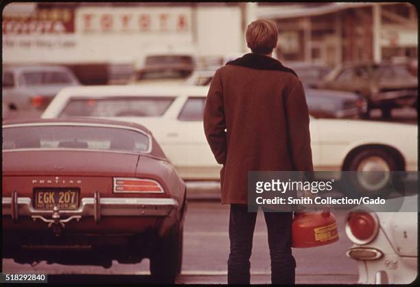 Some Motorists Ran Out of Gas Such as This Man in Portland and Had to Stand in Line with a Gas Can During the Fuel Crisis in the Pacific Northwest....