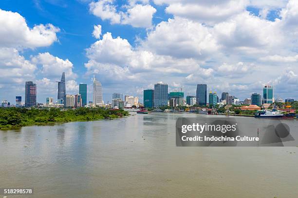 ho chi minh city skyline view over saigon river - saigon river stock pictures, royalty-free photos & images