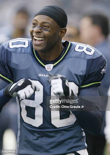 Wide receiver Jerry Rice of the Seattle Seahawks celebrates during the game against the Carolina Panthers at Qwest Field on October 31, 2004 in...