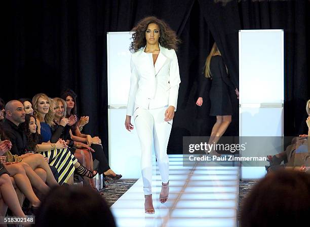 Model walks the runway at the envy By Melissa Gorga Fashion Show at Macaluso's on March 30, 2016 in Hawthorne, New Jersey.