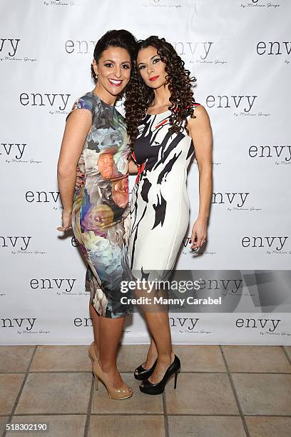 Robyn Levy and Christina Flores attend the Envy by Melissa Gorga Fashion Show at Macaluso's on March 30, 2016 in Hawthorne, New Jersey.