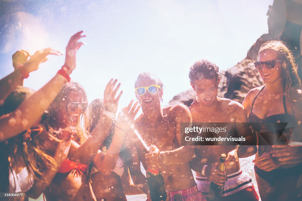 Friends Popping Champagne