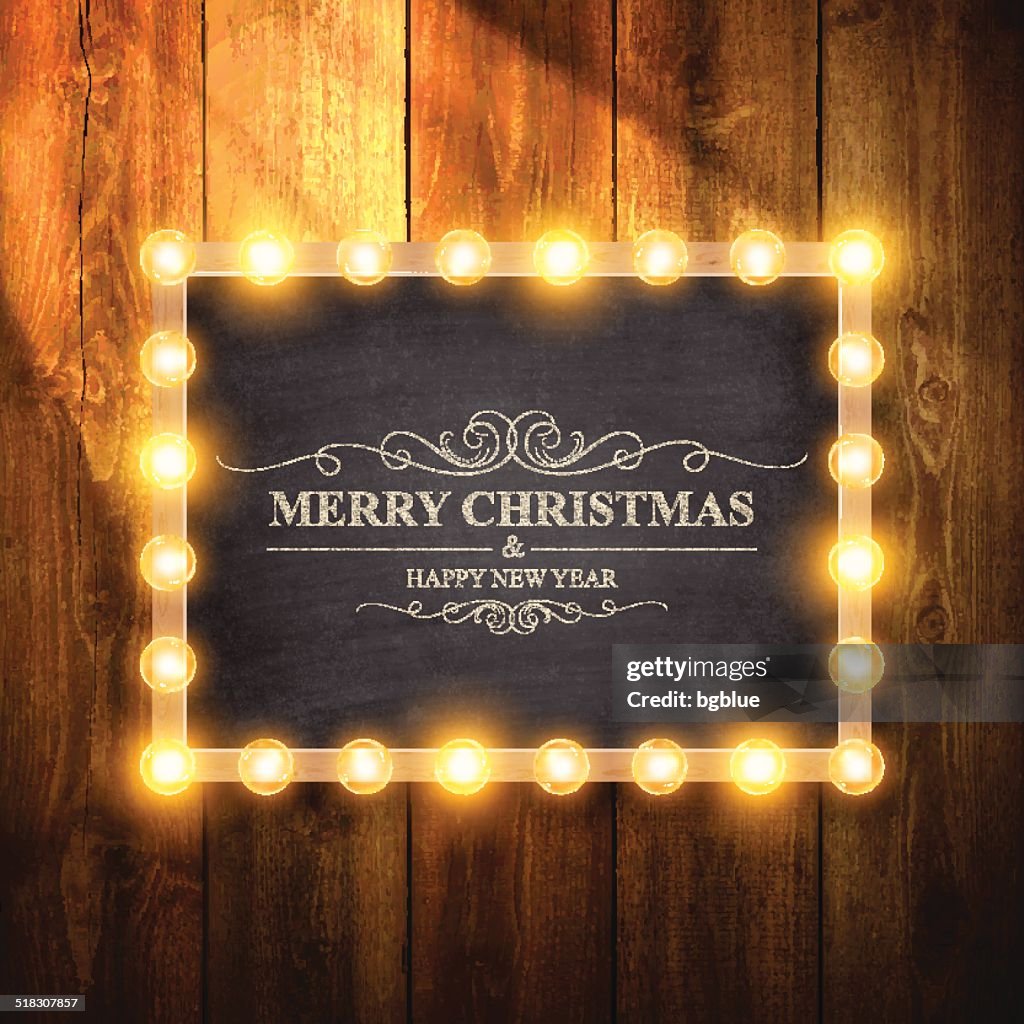 Christmas Lights auf Tafel und hölzerne Mauer