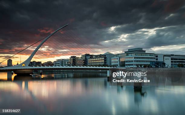 dublin sunset - samuel beckett bridge stock pictures, royalty-free photos & images