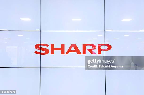 Large screen showing a Sharp Corp. Logo on March 31, 2016 in Tokyo, Japan. Taiwanese electronic manufacturer Foxconn made an official deal to...