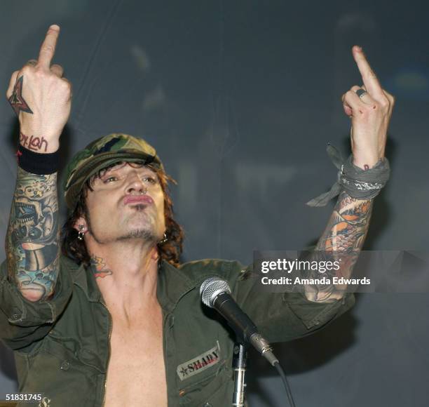 Drummer Tommy Lee and all the original members of Motely Crue reunite after six years to announce "Red, White & Crue Tour 2005...Better Live than...