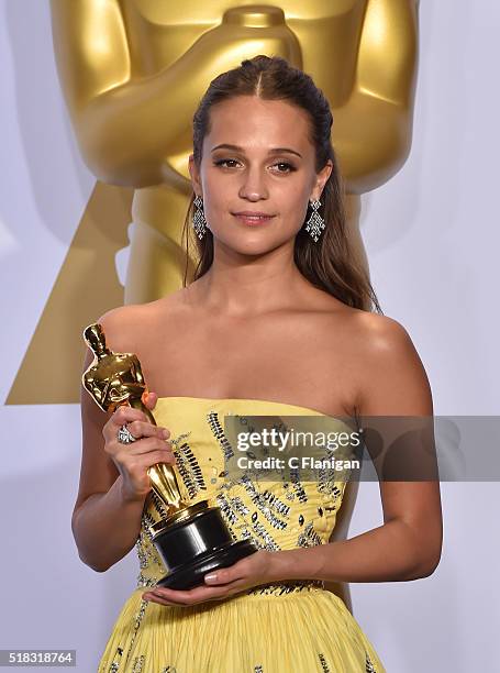 Actress Alicia Vikander, winner of the Best Actress in a Supporting Role award for 'The Danish Girl,' poses in the press room during the 88th Annual...