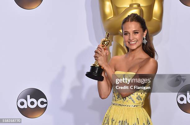 Actress Alicia Vikander, winner of the Best Actress in a Supporting Role award for 'The Danish Girl,' poses in the press room during the 88th Annual...