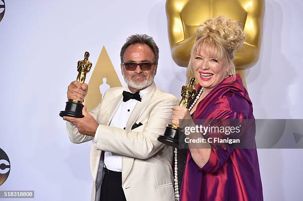 Production designer Colin Gibson and set decorator Lisa Thompson, winners of the Best Production Design award for 'Mad Max: Fury Road,' pose in the...