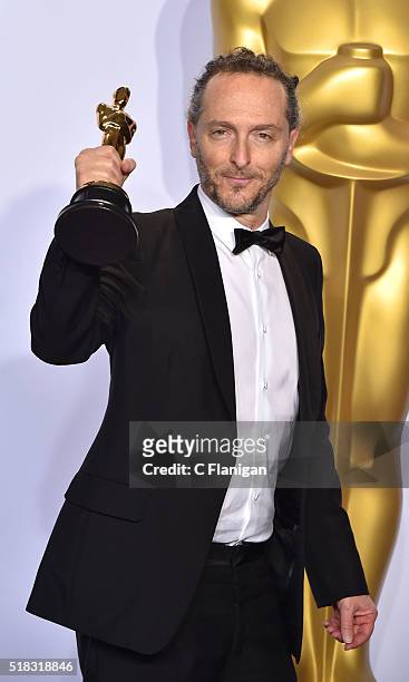 Cinematographer Emmanuel Lubezki, winner of the Best Cinematography award for 'The Revenant,' poses in the press room during the 88th Annual Academy...