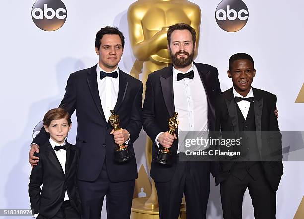 Producer Shan Christopher Ogilvie and director Benjamin Cleary , winners of the Best Live Action Short award for 'Stutterer,' pose with actors Jacob...