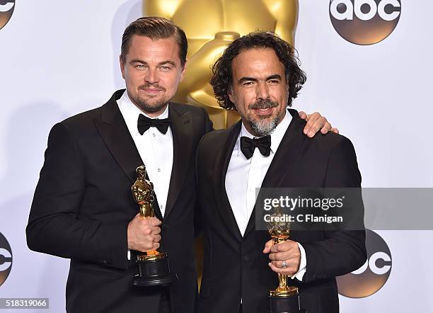 Actor Leonardo DiCaprio , winner of the award for Best Actor in a Leading Role for 'The Revenant,' and director Alejandro Gonzalez Inarritu, winner...