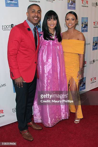 Marques Houston, Suzanne Whang and Karrueche Tran attend "Weekend With The Family" - Los Angeles Premiere on March 30, 2016 in Los Angeles,...