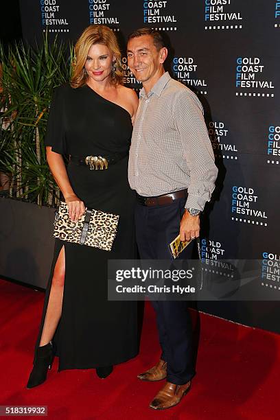 Chloe Maxwell and Mat Rogers arrive ahead of opening night of the Gold Coast Film Festival on March 31, 2016 in Gold Coast, Australia.