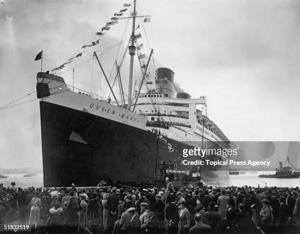 The Cunard White Star liner Queen Mary leaving the dock at Southampton on her maiden voyage, 27th May 1936.