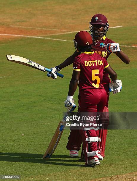 Britney Cooper of the West Indies celebrates after reaching his half century during the Women's ICC World Twenty20 India 2016 Semi Final match...