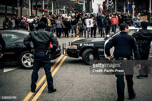 Protesters took the streets of downtown Cleveland, Ohio, the day after the local grand jury decided not to indict the officers who shot and killed...