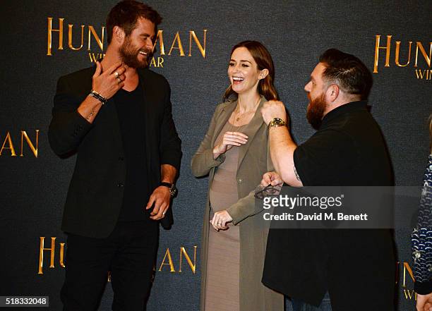 Chris Hemsworth, Emily Blunt and Nick Frost pose at a photocall for "The Huntsman: Winter's War" at Claridges Hotel on March 31, 2016 in London,...