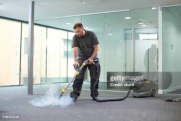 steam cleaning the office carpet - carpet stock pictures, royalty-free photos & images