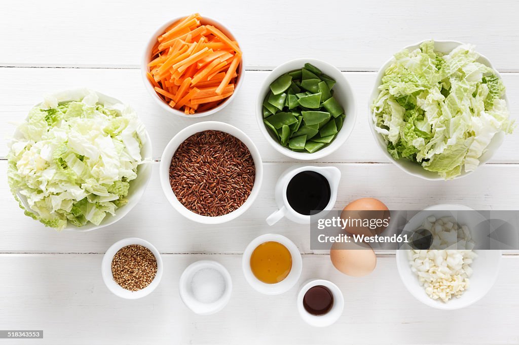 Ingredients for a wok dish with red rice