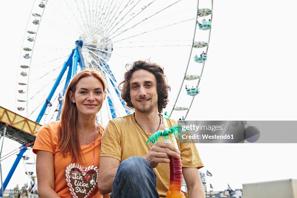 Young couple on a funfair