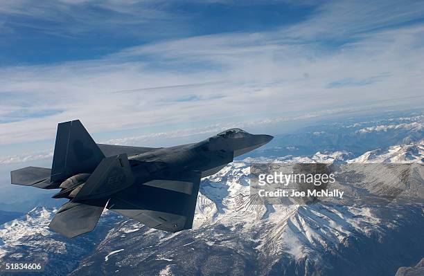The United States Air Force's F/A-22 Raptor, which will replace the F-15 bomber and is the first supersonic stealth fighter plane ever created flys...
