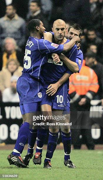 Danny Dichio of Millwall is congratulated by Marvin Elliott after scoring the second goal during the Coca-cola Championship match between...
